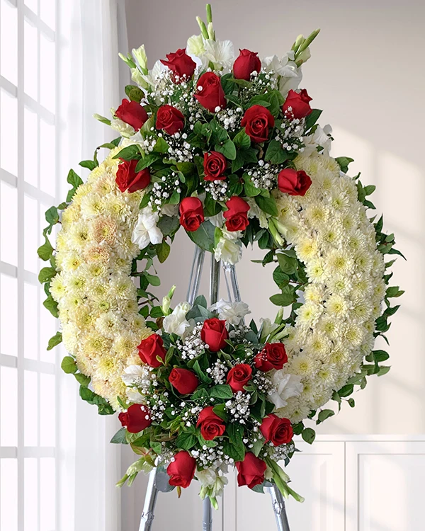 Lágrima fúnebre con flores mixtas